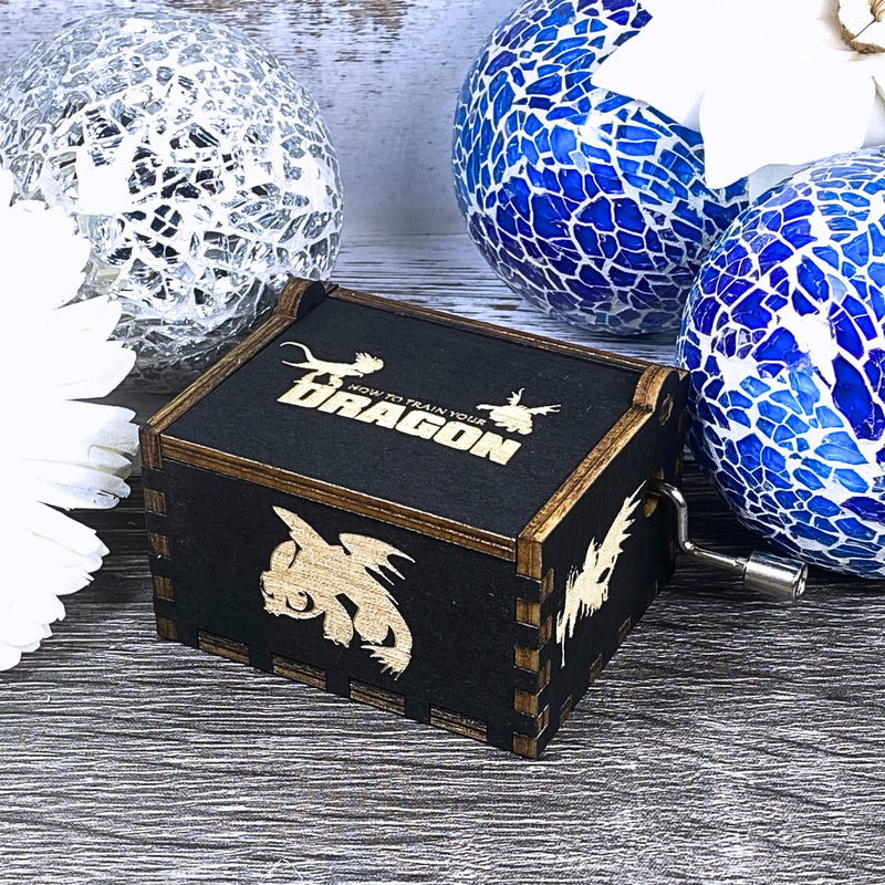 Load image into Gallery viewer, Looking for a gift for a How to Train Your Dragon fan? MarketPlacefad offers unique wooden music boxes that combine art and music perfectly. Each box produces a beautiful melody that will transport you to a world of pure delight.
