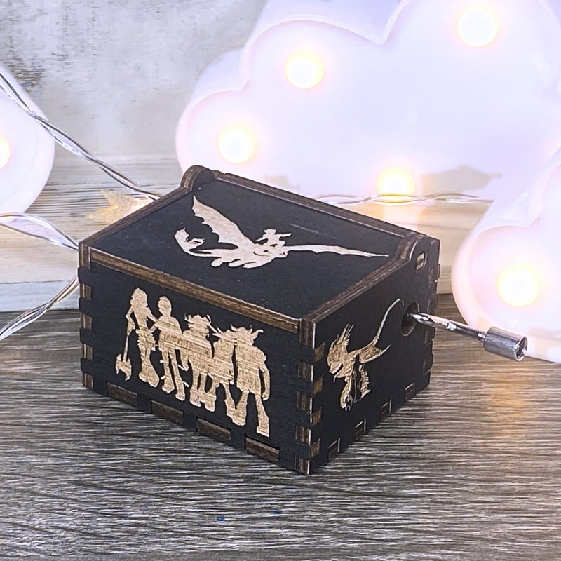 Load image into Gallery viewer, Looking for a gift for a How to Train Your Dragon fan? MarketPlacefad offers unique wooden music boxes that combine art and music perfectly. Each box produces a beautiful melody that will transport you to a world of pure delight.
