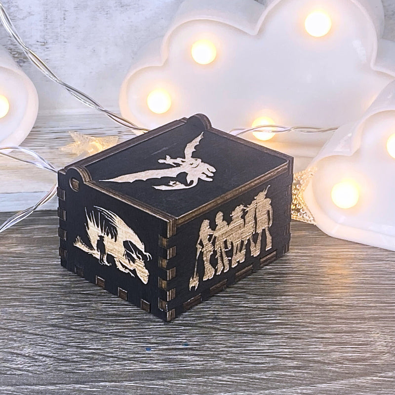 Load image into Gallery viewer, Looking for a gift for a How to Train Your Dragon fan? MarketPlacefad offers unique wooden music boxes that combine art and music perfectly. Each box produces a beautiful melody that will transport you to a world of pure delight.
