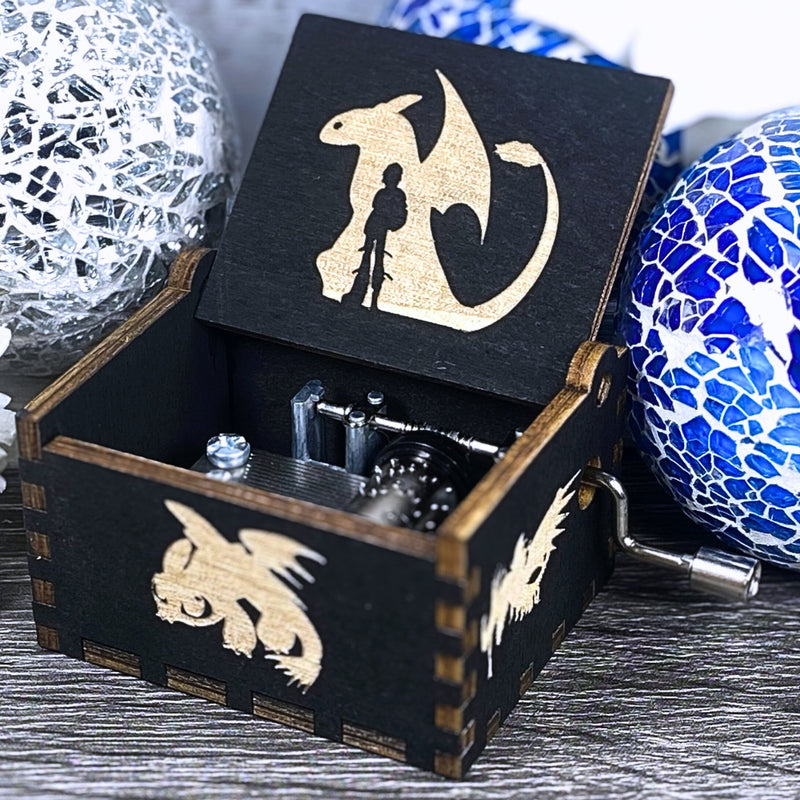 Load image into Gallery viewer, Looking for a gift for a How to Train Your Dragon fan? MarketPlacefad offers unique wooden music boxes that combine art and music perfectly. Each box produces a beautiful melody that will transport you to a world of pure delight.
