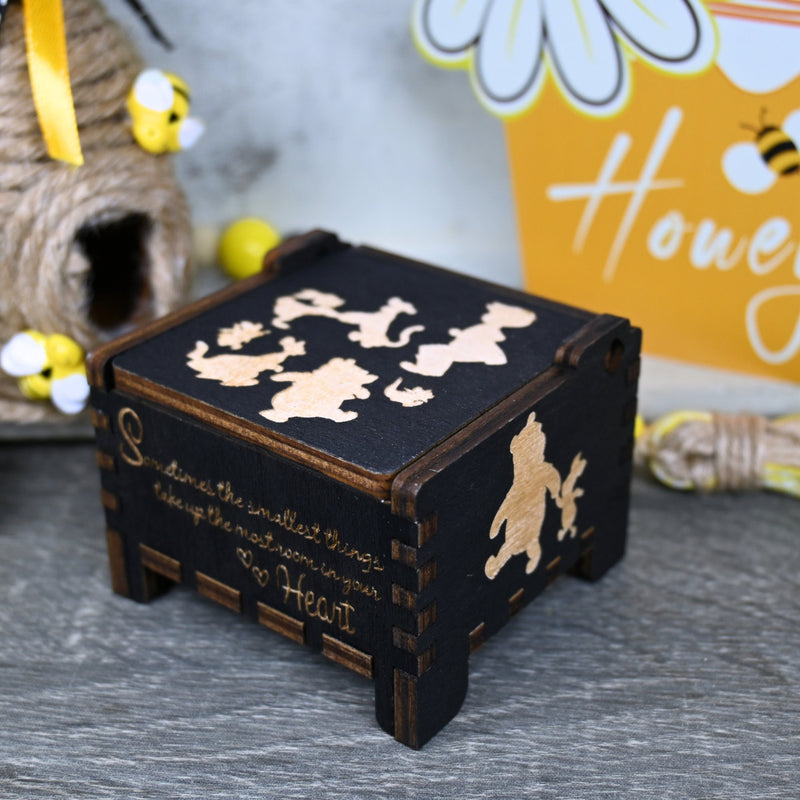 Load image into Gallery viewer, Embark on an adventure with classic Winnie-the-Pooh characters - Christopher Robin, Tigger, Piglet, Roo, and Eeyore - this exceptional music box lets you share these beautiful qualities with your loved one, buy one today!
