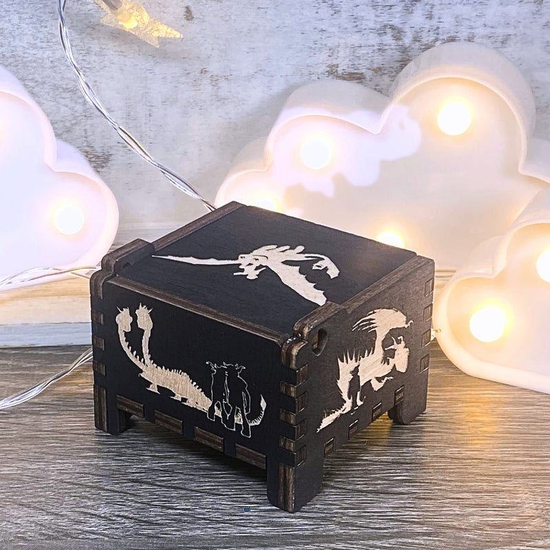 Load image into Gallery viewer, Looking for a gift for a How to Train Your Dragon fan? MarketPlacefad offers unique wooden music boxes that combine art and music perfectly. Each box produces a beautiful melody that will transport you to a world of pure delight.
