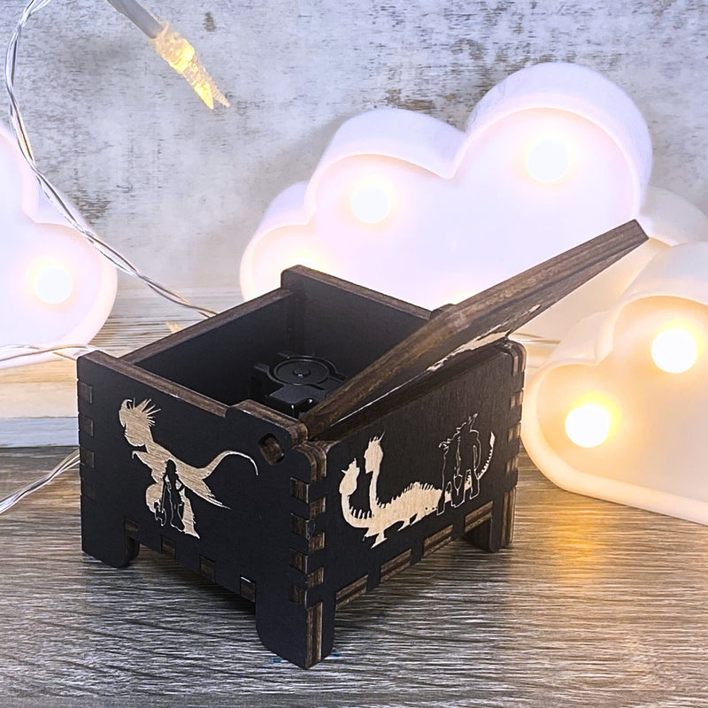 Load image into Gallery viewer, Looking for a gift for a How to Train Your Dragon fan? MarketPlacefad offers unique wooden music boxes that combine art and music perfectly. Each box produces a beautiful melody that will transport you to a world of pure delight.
