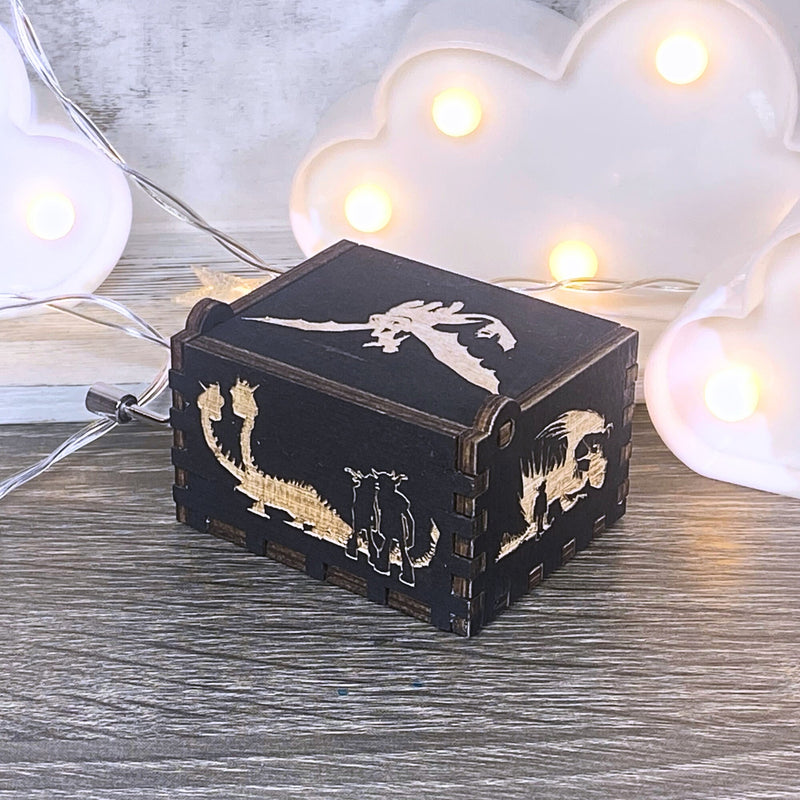 Load image into Gallery viewer, Looking for a gift for a How to Train Your Dragon fan? MarketPlacefad offers unique wooden music boxes that combine art and music perfectly. Each box produces a beautiful melody that will transport you to a world of pure delight.
