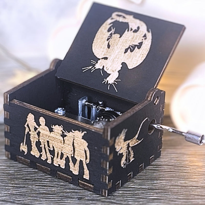 Load image into Gallery viewer, Looking for a gift for a How to Train Your Dragon fan? MarketPlacefad offers unique wooden music boxes that combine art and music perfectly. Each box produces a beautiful melody that will transport you to a world of pure delight.
