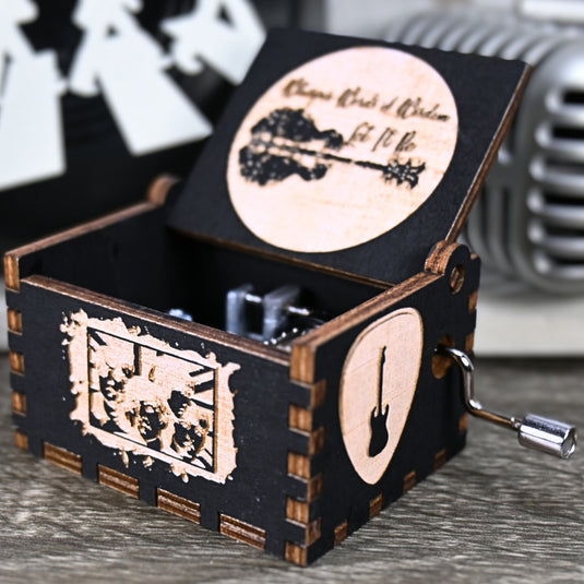 Immerse yourself in the classics of The Beatles as you listen to their legendary songs and lyrics emanating from the finely tuned wooden box. Each music box is a testament to the artistry and attention to detail, making it a perfect gift for anyone!