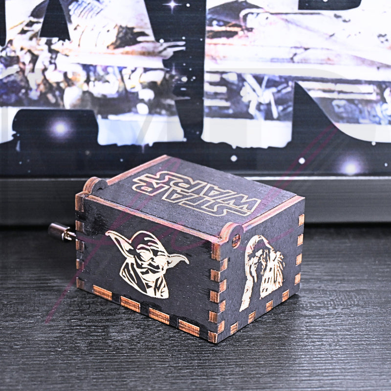 Load image into Gallery viewer, Are you a devoted follower of the Star Wars franchise? If so, you&#39;ll be thrilled to experience the excitement and adventure of your favorite movies in a whole new dimension with this exquisite music box. The box is masterfully handcrafted.
