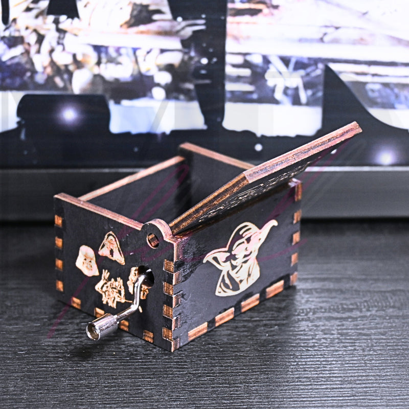 Load image into Gallery viewer, Are you a devoted follower of the Star Wars franchise? If so, you&#39;ll be thrilled to experience the excitement and adventure of your favorite movies in a whole new dimension with this exquisite music box. The box is masterfully handcrafted.
