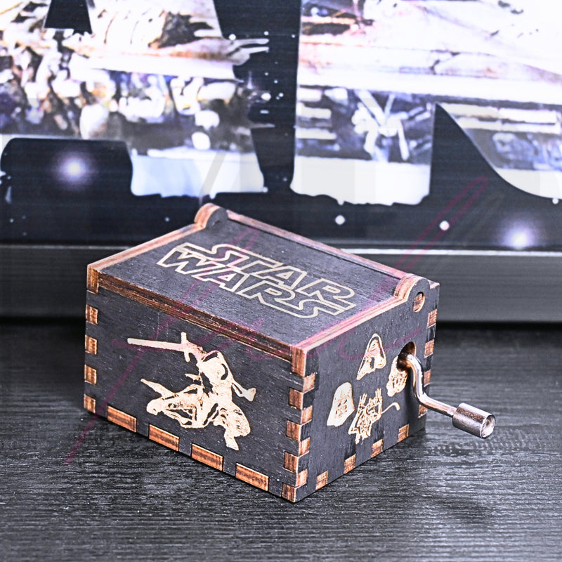 Load image into Gallery viewer, Are you a devoted follower of the Star Wars franchise? If so, you&#39;ll be thrilled to experience the excitement and adventure of your favorite movies in a whole new dimension with this exquisite music box. The box is masterfully handcrafted.
