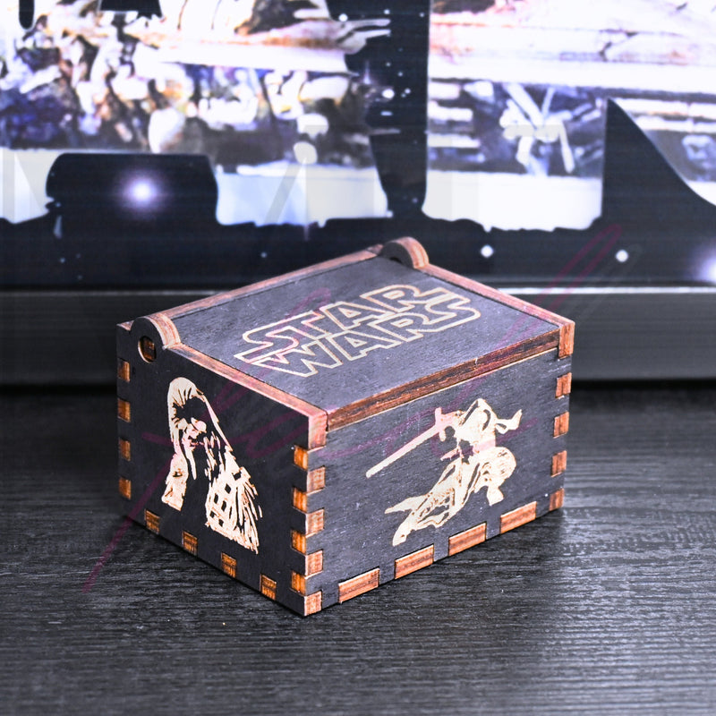 Load image into Gallery viewer, Are you a devoted follower of the Star Wars franchise? If so, you&#39;ll be thrilled to experience the excitement and adventure of your favorite movies in a whole new dimension with this exquisite music box. The box is masterfully handcrafted.
