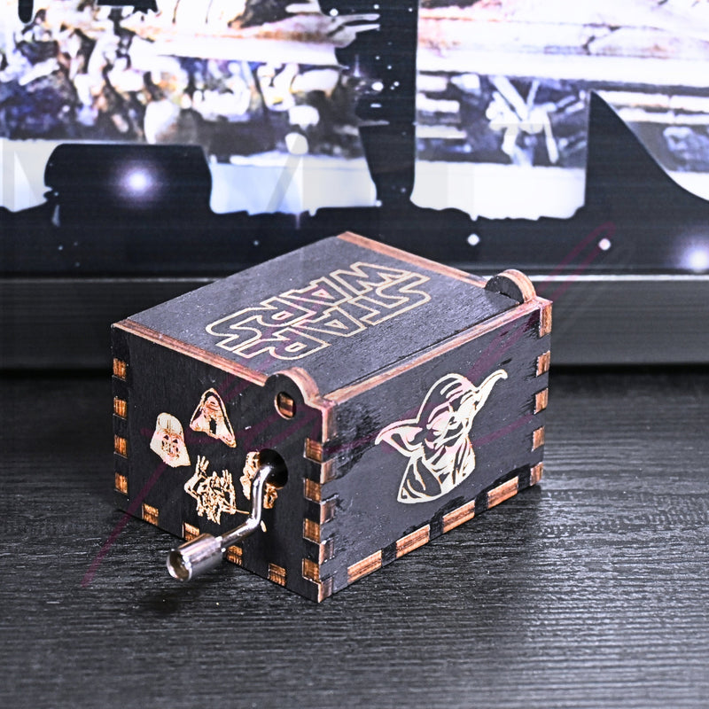 Load image into Gallery viewer, Are you a devoted follower of the Star Wars franchise? If so, you&#39;ll be thrilled to experience the excitement and adventure of your favorite movies in a whole new dimension with this exquisite music box. The box is masterfully handcrafted.
