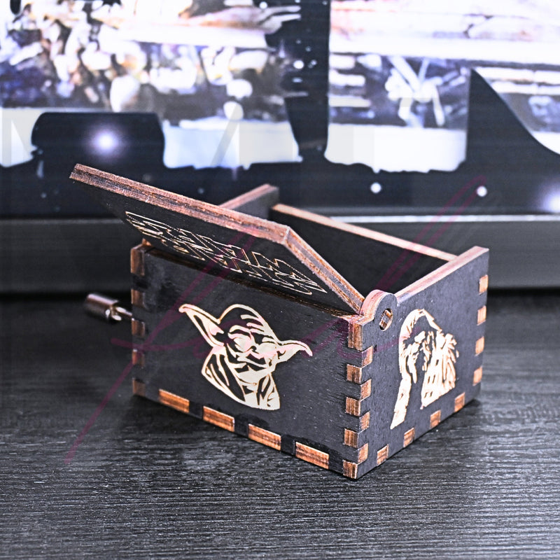 Load image into Gallery viewer, Are you a devoted follower of the Star Wars franchise? If so, you&#39;ll be thrilled to experience the excitement and adventure of your favorite movies in a whole new dimension with this exquisite music box. The box is masterfully handcrafted.
