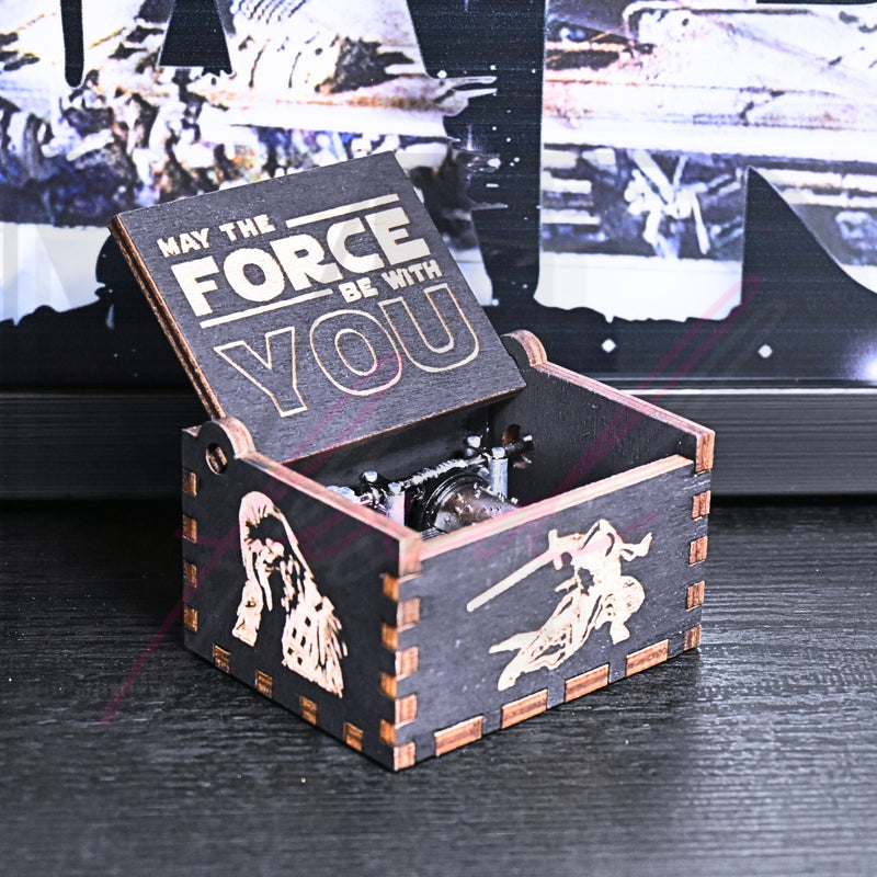 Load image into Gallery viewer, Are you a devoted follower of the Star Wars franchise? If so, you&#39;ll be thrilled to experience the excitement and adventure of your favorite movies in a whole new dimension with this exquisite music box. The box is masterfully handcrafted.
