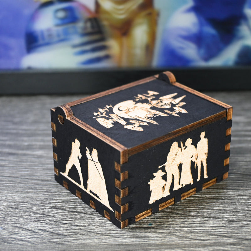 Load image into Gallery viewer, Are you a devoted follower of the Star Wars franchise? If so, you&#39;ll be thrilled to experience the excitement and adventure of your favorite movies in a whole new dimension with this exquisite music box. The box is masterfully handcrafted.
