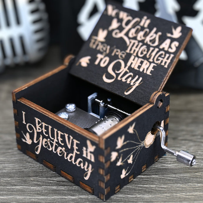 Immerse yourself in the classics of The Beatles as you listen to their legendary songs and lyrics emanating from the finely tuned wooden box. Each music box is a testament to the artistry and attention to detail, making it a perfect gift for anyone!