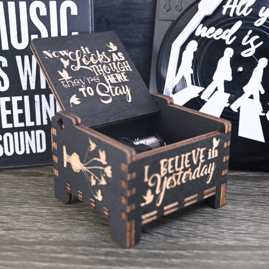 Immerse yourself in the classics of The Beatles as you listen to their legendary songs and lyrics emanating from the finely tuned wooden box. Each music box is a testament to the artistry and attention to detail, making it a perfect gift for anyone!